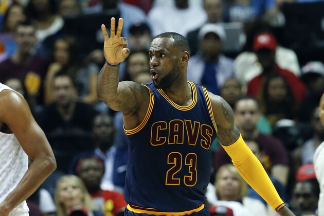 Cleveland Cavaliers forward LeBron James (23) gestures after a Cavaliers basket as Atlanta Hawks center Al Horford (15) looks on in the first half of Game 4 of the second-round NBA basketball playoff series, Sunday, May 8, 2016, in Atlanta. (AP Photo/John Bazemore) Cleveland Cavaliers forward LeBron James (23) gestures after a Cavaliers basket as Atlanta Hawks center Al Horford (15) looks on in the first half of Game 4 of the second-round NBA basketball playoff series, Sunday, May 8, 2016, in Atlanta. (AP Photo/John Bazemore)
