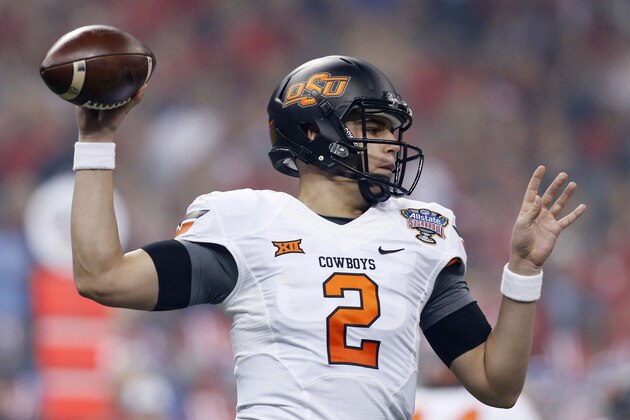 Oklahoma State quarterback Mason Rudolph (2) passes in the first half of the Sugar Bowl college football game in New Orleans, Friday, Jan. 1, 2016. (AP Photo/Jonathan Bachman)