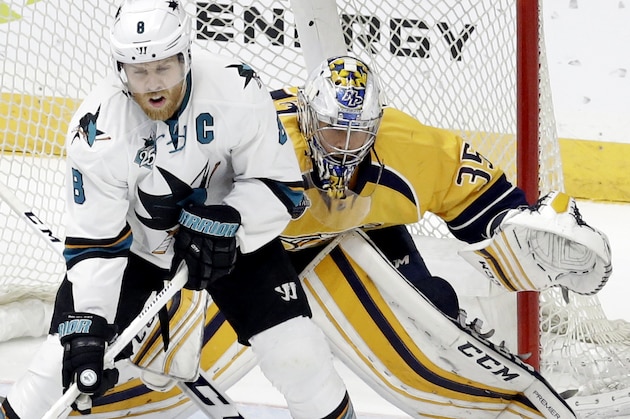 Nashville Predators goalie Pekka Rinne (35), of Finland, looks around San Jose Sharks center Joe Pavelski (8) for the puck during the third period in Game 6 of an NHL hockey Stanley Cup Western Conference semifinal playoff series Wednesday, Dec. 31, 2016, in Nashville, Tenn. (AP Photo/Mark Humphrey)