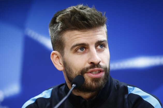 FC Barcelona's Gerard Pique attends a press conference at the Sports Center FC Barcelona Joan Gamper in San Joan Despi, Spain, Monday, April 4, 2016.  FC Barcelona will play against Atletico Madrid in a Champions League soccer match on Tuesday, April 5. (AP Photo/Manu Fernandez)