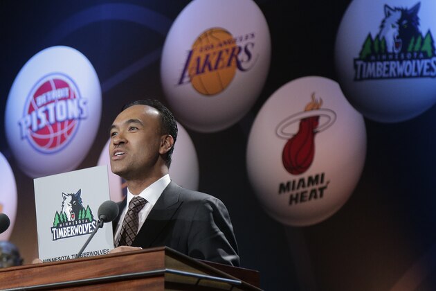 NBA Deputy Commissioner Mark Tatum announces the Minnesota Timberwolves as the winner of the top pick, during the NBA basketball draft lottery, Tuesday, May 19, 2015, in New York. (AP Photo/Julie Jacobson)