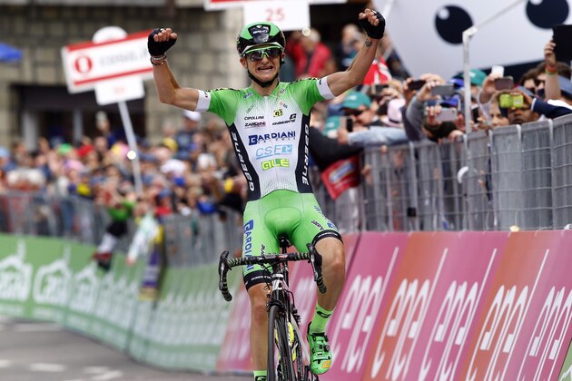 Italian cyclist Giulio Ciccone - team CSF, celebrates as he crosses the finish line to win the 10th stage of 99th Giro d'Italia, Tour of Italy, from Campi Bisenzio to Sestola on May 17, 2016 in Sestola, Italy.  
Italian Giulio Ciccone won the tenth stage of the Giro d'Italia ahead of Ivan Rovny and Darwin Atapuma / AFP / LUK BENIES        (Photo credit should read LUK BENIES/AFP/Getty Images)