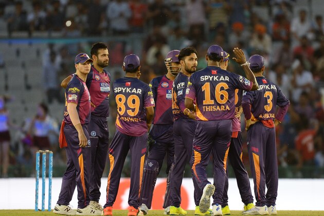Rising Pune Supergiants players celebrate the dismissal of Kings XI Punjab batsman Manan Vohra during the 2016 Indian Premier League (IPL) Twenty20 cricket match between Rising Pune Supergiants and Kings XI Punjab at The Punjab Cricket Association Stadium in Mohali on April 17, 2016  ------IMAGE RESTRICTED TO EDITORIAL USE - STRICTLY NO COMMERCIAL USE------ / AFP / SAJJAD HUSSAIN        (Photo credit should read SAJJAD HUSSAIN/AFP/Getty Images)