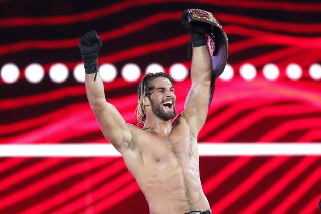 WWE Superstar Seth Rollins celebrates becoming the new WWE World Heavyweight Champion at WrestleMania 31 at Levi's Stadium on Sunday, March 29, 2015 in Santa Clara, CA. WrestleMania broke the Levi’s Stadium attendance record at 76,976 fans from all 50 states and 40 countries. (Don Feria/AP Images for WWE)