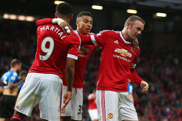 MANCHESTER, ENGLAND - MAY 17:  Wayne Rooney of Manchester United celebrates with Anthony Martial (9) and Jesse Lingard (35) as he scores their first goal during the Barclays Premier League match between Manchester United and AFC Bournemouth at Old Trafford on May 17, 2016 in Manchester, England.  (Photo by Alex Livesey/Getty Images)