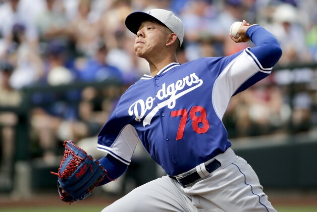 Los Angeles Dodgers starting pitcher Julio Urias throws during a spring training baseball exhibition game against the Chicago Cubs in Mesa, Ariz., on Wednesday, March 11, 2015. (AP Photo/Chris Carlson) Los Angeles Dodgers starting pitcher Julio Urias throws during a spring training baseball exhibition game against the Chicago Cubs in Mesa, Ariz., on Wednesday, March 11, 2015. (AP Photo/Chris Carlson)