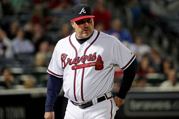 Atlanta Braves manager Fredi Gonzalez walks to the dugout in a baseball game against the Arizona Diamondbacks Friday, May 6, 2016, in Atlanta. (AP Photo/David Goldman)
