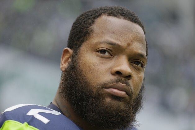 Seattle Seahawks defensive end Michael Bennett before an NFL football game against the Carolina Panthers, Sunday, Oct. 18, 2015, in Seattle. (AP Photo/Elaine Thompson)