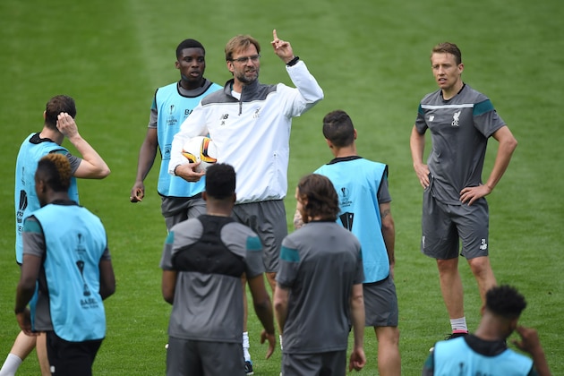 Liverpool's German manager Jurgen Klopp gestures during a training session of his team at the St Jakob-Park stadium in Basel, northern Switzerland, on May 17, 2016, on the eve of the UEFA Europa League final football match between Liverpool and Sevilla.  / AFP / FABRICE COFFRINI        (Photo credit should read FABRICE COFFRINI/AFP/Getty Images)