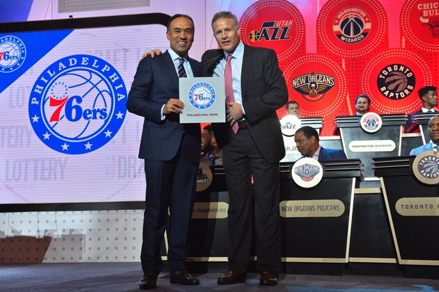NEW YORK, NEW YORK - MAY 17:  Mark Tatum, NBA's deputy commissioner, poses for a photo with Brett Brown of the Philadelphia 76ers as they get the #1 pick during the 2016 NBA Draft Lottery at the New York Hilton in New York, New York. NOTE TO USER: User expressly acknowledges and agrees that, by downloading and or using this Photograph, user is consenting to the terms and conditions of the Getty Images License Agreement.  Mandatory Copyright Notice: Copyright 2016 NBAE (Photo by Jesse D. Garrabrant/NBAE via Getty Images)