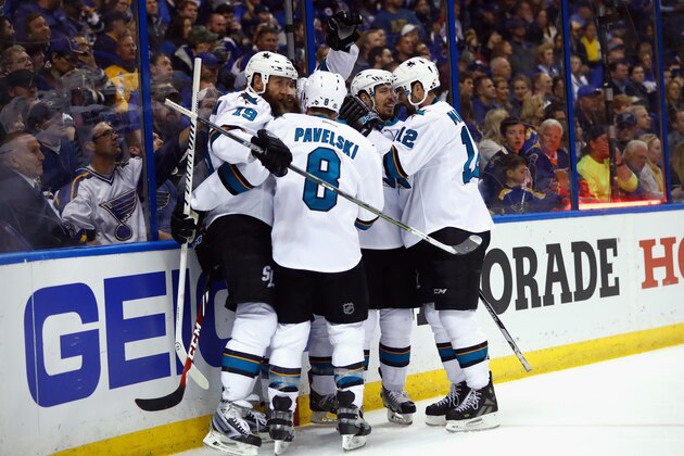ST LOUIS, MO - MAY 17:  Brent Burns #88 of the San Jose Sharks celebrates with Joe Thornton #19, Joe Pavelski #8, Logan Couture #39, and Patrick Marleau #12 after scoring a second period goal against Brian Elliott #1 of the St. Louis Blues in Game Two of the Western Conference Final during the 2016 NHL Stanley Cup Playoffs at Scottrade Center on May 17, 2016 in St Louis, Missouri.  (Photo by Jamie Squire/Getty Images)