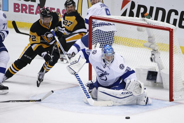 Pittsburgh Penguins' Patric Hornqvist (72) shoots the puck past Tampa Bay Lightning goalie Andrei Vasilevskiy and misses during the third period of Game 2 of the NHL hockey Stanley Cup Eastern Conference finals Monday, May 16, 2016, in Pittsburgh. (AP Photo/Gene J. Puskar)