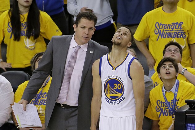 Golden State Warriors assistant coach Luke Walton, left, talks with guard Stephen Curry (30) during the second half of Game 1 of the NBA basketball Western Conference finals against the Oklahoma City Thunder in Oakland, Calif., Monday, May 16, 2016. The Thunder won 108-102. (AP Photo/Jeff Chiu)