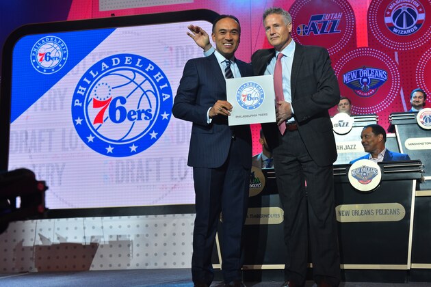NEW YORK, NEW YORK - MAY 17:  Mark Tatum, NBA's deputy commissioner, poses for a photo with Brett Brown of the Philadelphia 76ers as they get the #1 pick during the 2016 NBA Draft Lottery at the New York Hilton in New York, New York. NOTE TO USER: User expressly acknowledges and agrees that, by downloading and or using this Photograph, user is consenting to the terms and conditions of the Getty Images License Agreement.  Mandatory Copyright Notice: Copyright 2016 NBAE (Photo by Jesse D. Garrabrant/NBAE via Getty Images)