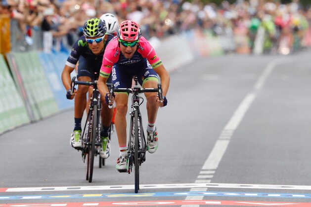 CORRECTION NATIONALITY OF THE RIDER - Italy's Diego Ulissi (front) of team Lampre-Merida sprints to win the 11th stage of the 99th Giro d'Italia, Tour of Italy, from Modena to Asolo on May 18, 2016. Ulissi won the stage ahead of Costa Rica's Andrey Amador of team Movistar and Pink jersey Luxembourg's rider Bob Jungels of Etixx - Quick Step. / AFP / Luk BENIES (Photo credit should read LUK BENIES/AFP/Getty Images) CORRECTION NATIONALITY OF THE RIDER - Italy's Diego Ulissi (front) of team Lampre-Merida sprints to win the 11th stage of the 99th Giro d'Italia, Tour of Italy, from Modena to Asolo on May 18, 2016. Ulissi won the stage ahead of Costa Rica's Andrey Amador of team Movistar and Pink jersey Luxembourg's rider Bob Jungels of Etixx - Quick Step. / AFP / Luk BENIES (Photo credit should read LUK BENIES/AFP/Getty Images)