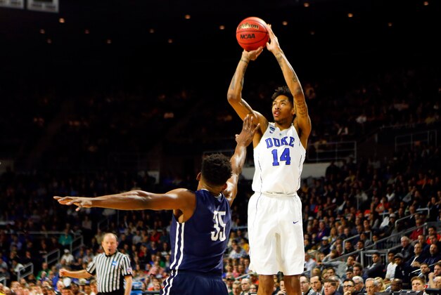 Mar 19, 2016; Providence, RI, USA; Duke Blue Devils guard Brandon Ingram (14) shoots over Yale Bulldogs forward Brandon Sherrod (35) during the second half of a second round game of the 2016 NCAA Tournament at Dunkin Donuts Center. Mandatory Credit: Winslow Townson-USA TODAY Sports