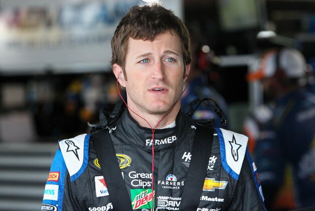 May 13, 2016; Dover, DE, USA; NASCAR Sprint Cup driver Kasey Kahne stands in the garage during practice for the AAA 400 Drive For Autism at Dover International Speedway. Mandatory Credit: Matthew O'Haren-USA TODAY Sports