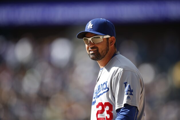 Los Angeles Dodgers first baseman Adrian Gonzalez (23) in the fifth inning of a baseball game Sunday, April 24, 2016, in Denver. The Dodgers won 12-10. (AP Photo/David Zalubowski)