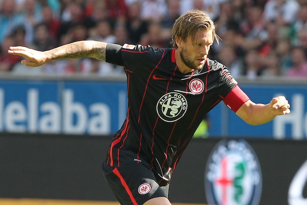 Frankfurt's defender Marco Russ plays the ball during the German first division Bundesliga football match Eintracht Frankfurt v FC Augsburg, on August 22, 2015 in Frankfurt/Main.   AFP PHOTO / DANIEL ROLAND  RESTRICTIONS: DURING MATCH TIME: DFL RULES TO LIMIT THE ONLINE USAGE TO 15 PICTURES PER MATCH AND FORBID IMAGE SEQUENCES TO SIMULATE VIDEO.  == RESTRICTED TO EDITORIAL USE == FOR FURTHER QUERIES PLEASE CONTACT DFL DIRECTLY AT + 49 69 650050.        (Photo credit should read DANIEL ROLAND/AFP/Getty Images)