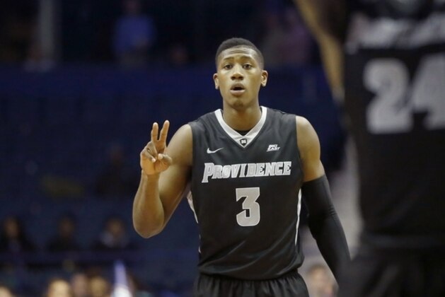 Providence guard Kris Dunn calls a defensive play during the first half of an NCAA college basketball game against DePaul Tuesday, Feb. 2, 2016, in Rosemont, Ill. (AP Photo/Charles Rex Arbogast)