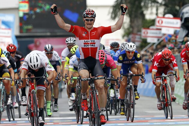 German cyclist Andre Greipel (C) raises his arms in victory as he crosses the finish line of the Giro d'Italia (tour of Italy) 7th stage, in Foligno, on May 13, 2016.  / AFP / LUK BENIES        (Photo credit should read LUK BENIES/AFP/Getty Images)