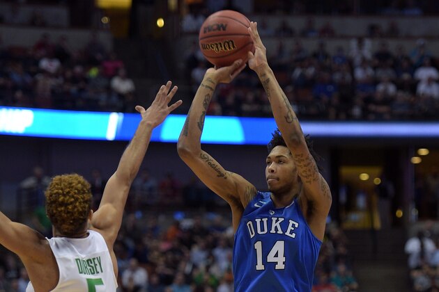 ANAHEIM, CA - MARCH 24: Brandon Ingram #14 of the Duke Blue Devils puts up a shot against Tyler Dorsey #5 of the Oregon Ducks during the West Regional Semifinal of the 2016 NCAA Men's Basketball Tournament at Honda Center on March 24, 2016 in Anaheim, California. (Photo by Lance King/Getty Images)