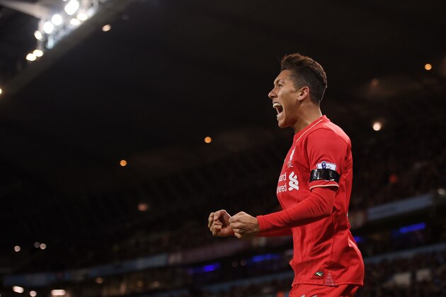 MANCHESTER, ENGLAND - NOVEMBER 21:  Roberto Firmino of Liverpool celebrates his team's first goal scored by Eliaquim Mangala of Manchester City during the Barclays Premier League match between Manchester City and Liverpool at Etihad Stadium on November 21, 2015 in Manchester, England.  (Photo by Michael Regan/Getty Images)