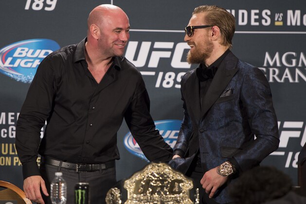 LAS VEGAS, NV - JULY 11:  UFC President Dana White (L) and UFC interim featherweight champion Conor McGregor interact during the UFC 189 post fight press conference at the MGM Grand Garden Arena on July 11, 2015 in Las Vegas, Nevada. (Photo by Jeff Bottari/Zuffa LLC/Zuffa LLC via Getty Images)