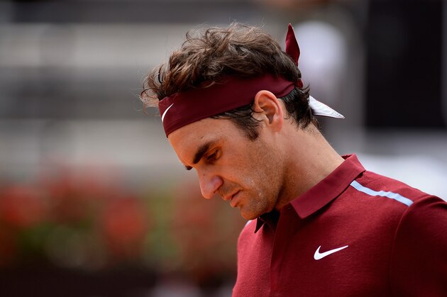 ROME, ITALY - MAY 12:  Roger Federer of Switzerland reacts during his match against Dominic Thiem of Austria on Day Five of The Internazionali BNL d'Italia on May 12, 2016 in Rome, Italy.  (Photo by Dennis Grombkowski/Getty Images)