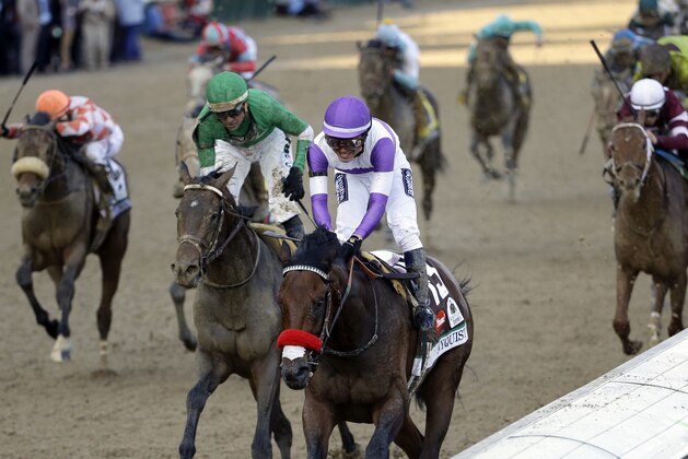 FILE - In this May 7, 2016, file photo, jockey Mario Gutierrez rides Nyquist, center, to victory ahead of Exaggerator, front left, ridden by Kent Desormeaux, in the 142nd running of the Kentucky Derby horse race at Churchill Downs in Louisville, Ky. The Desormeaux brothers, Exaggerator's trainer and jockey, still think they can beat Nyquist. They'll get their chance on Saturday, in the Preakness Stakes.  (AP Photo/David J. Phillip, File)