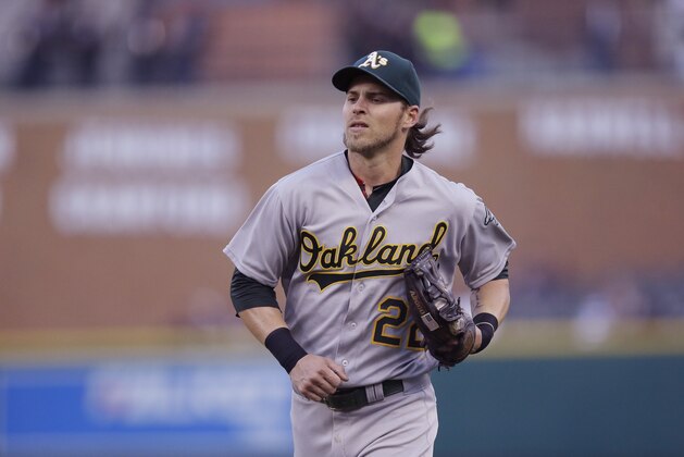 Oakland Athletics right fielder Josh Reddick runs to the dugout during the second inning of a baseball game against the Detroit Tigers, Monday, April 25, 2016 in Detroit. (AP Photo/Carlos Osorio)