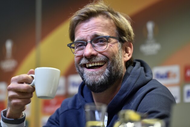 Liverpool's manager Juergen Klopp smiles during a press conference prior to the Europa League quarterfinal soccer match between Borussia Dortmund and Liverpool FC in Dortmund, Germany, Wednesday, April 6, 2016. (AP Photo/Martin Meissner)