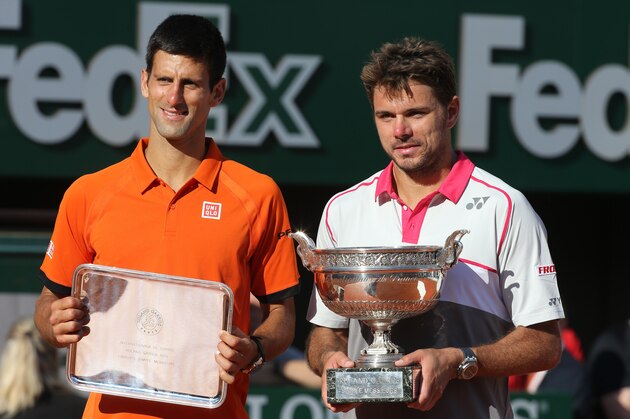 PARIS, FRANCE - JUNE 7: Stanislas Wawrinka of Switzerland (right) poses with the Coupe de Mousquetaires and runner up Novak Djokovic of Serbia  after the men's final on day 15 of the French Open 2015 at Roland Garros stadium on June 1, 2015 in Paris, France. (Photo by Jean Catuffe/Getty Images)