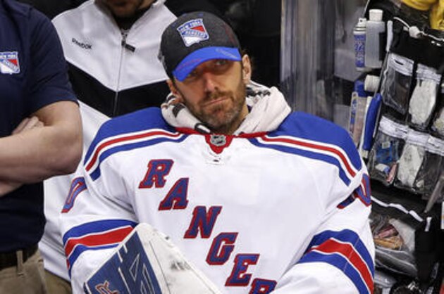 New York Rangers goalie Henrik Lundqvist sits on the bench during the third period after being pulled during game 5 in a first-round NHL playoff hockey game against the Pittsburgh Penguins in Pittsburgh, Saturday, April 23, 2016. The Penguins won 6-3, to clinch the best-of-seven games series 4-1. (AP Photo/Gene J. Puskar)