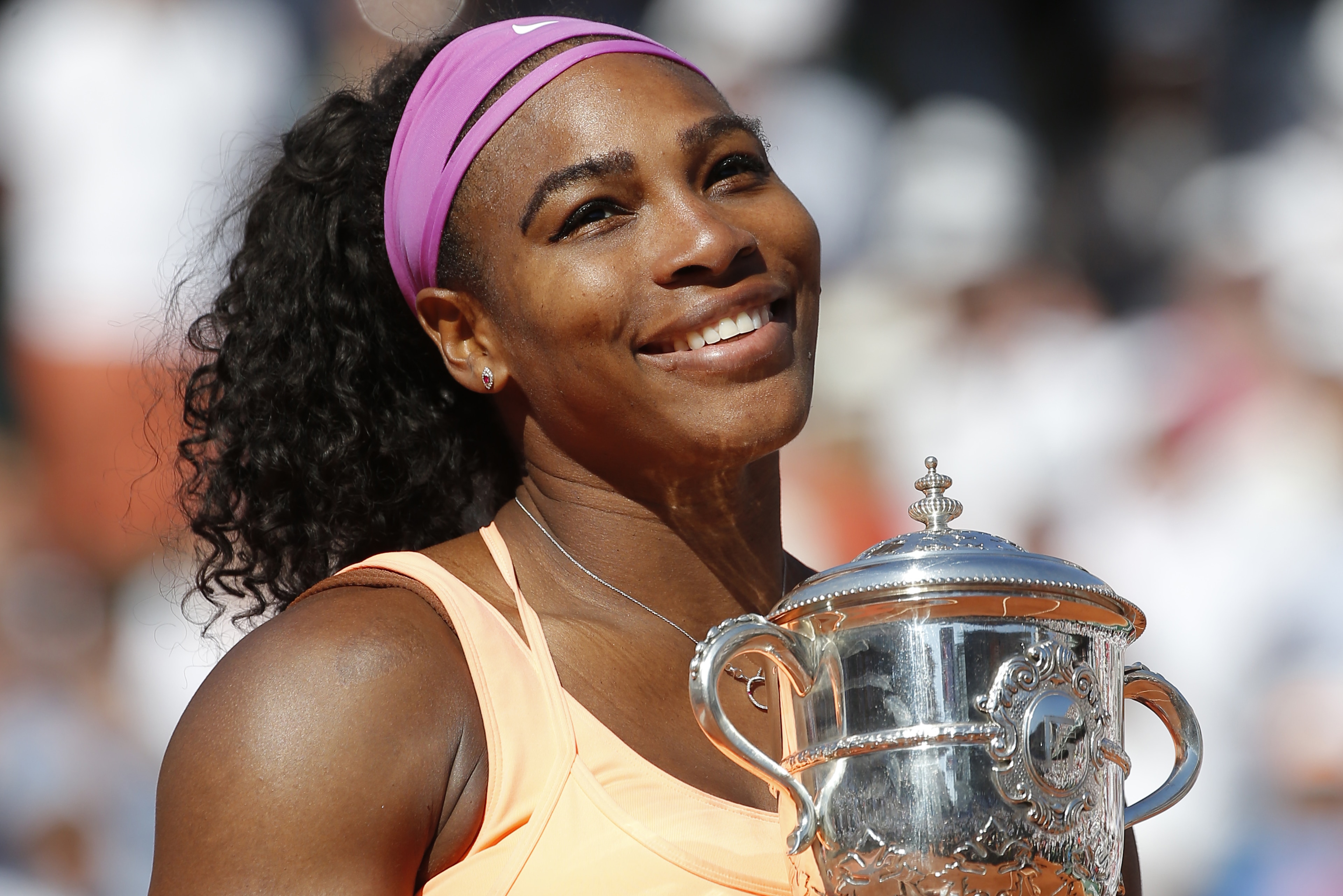 Serena Williams of the U.S. holds the trophy after winning the final of the French Open tennis tournament against Lucie Safarova of the Czech Republic in three sets, 6-3, 6-7, 6-2, at the Roland Garros stadium, in Paris, France, Saturday, June 6, 2015. (AP Photo/Michel Euler) Serena Williams of the U.S. holds the trophy after winning the final of the French Open tennis tournament against Lucie Safarova of the Czech Republic in three sets, 6-3, 6-7, 6-2, at the Roland Garros stadium, in Paris, France, Saturday, June 6, 2015. (AP Photo/Michel Euler)