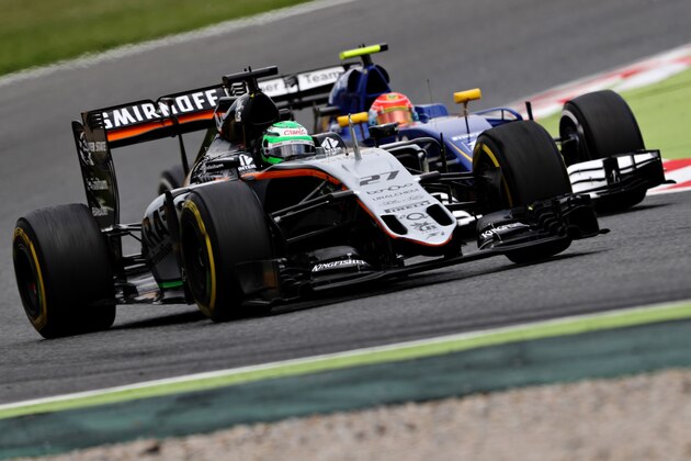 MONTMELO, SPAIN - MAY 13: Nico Hulkenberg of Germany driving the (27) Sahara Force India F1 Team VJM09 Mercedes PU106C Hybrid turbo and Felipe Nasr of Brazil driving the (12) Sauber F1 Team Sauber C35 Ferrari 059/5 turbo on track during practice for the Spanish Formula One Grand Prix at Circuit de Catalunya on May 13, 2016 in Montmelo, Spain.  (Photo by Mark Thompson/Getty Images)