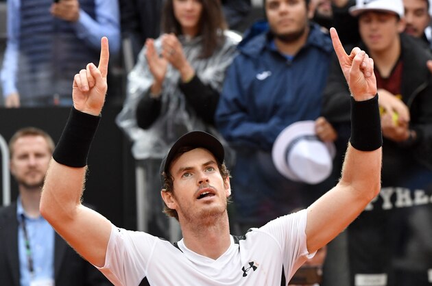 Britain's Andy Murray celebrates after winning the men's final match against Novak Djokovic of Serbia at the ATP Tennis Open on May 15, 2016 at the Foro Italico in Rome. / AFP / TIZIANA FABI        (Photo credit should read TIZIANA FABI/AFP/Getty Images)