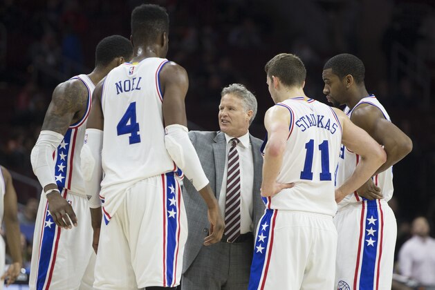 PHILADELPHIA, PA - JANUARY 26: Head coach Brett Brown of the Philadelphia 76ers talks to Robert Covington #33, Nerlens Noel #4, Nik Stauskas #11, and Hollis Thompson #31 during a timeout in the game against the Phoenix Suns on January 26, 2016 at the Wells Fargo Center in Philadelphia, Pennsylvania. The 76ers defeated the Suns 113-103. NOTE TO USER: User expressly acknowledges and agrees that, by downloading and or using this photograph, User is consenting to the terms and conditions of the Getty Images License Agreement. (Photo by Mitchell Leff/Getty Images)