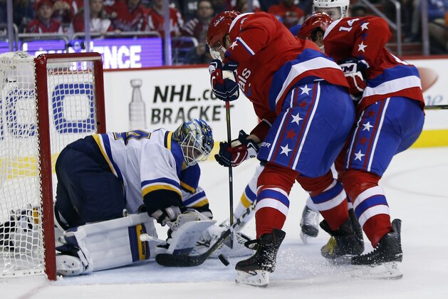 St. Louis Blues goalie Jake Allen (34) stops a shot by Washington Capitals left wing Alex Ovechkin (8), from Russia, with right wing Justin Williams (14) Sweden, nearby, in the third period of an NHL hockey game, Saturday, March 26, 2016, in Washington. AP Photo/Alex Brandon) St. Louis Blues goalie Jake Allen (34) stops a shot by Washington Capitals left wing Alex Ovechkin (8), from Russia, with right wing Justin Williams (14) Sweden, nearby, in the third period of an NHL hockey game, Saturday, March 26, 2016, in Washington. AP Photo/Alex Brandon)