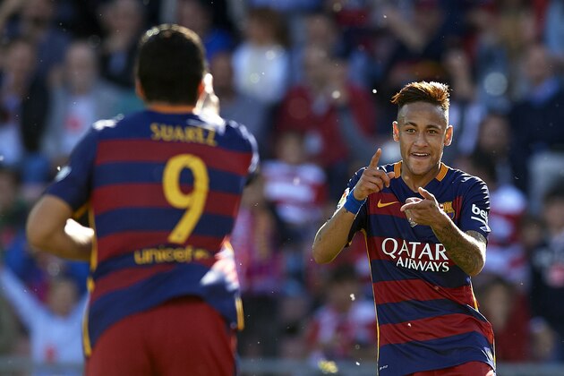 GRANADA, SPAIN - MAY 14:  Luis Suarez of FC Barcelona celebrates scoring his team's third goal with his teammate Neymar JR during the La Liga match between Granada CF and FC Barcelona at Estadio Nuevo Los Carmenes on May 14, 2016 in Granada, Spain.  (Photo by Manuel Queimadelos Alonso/Getty Images)