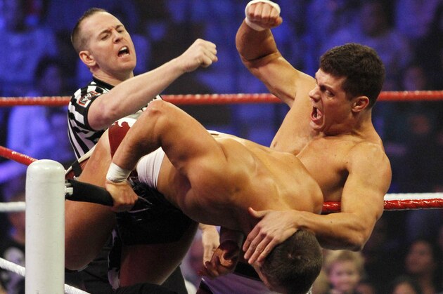 Cody Rhodes,right, and Daniel Bryan peform during WWE’s 9th annual