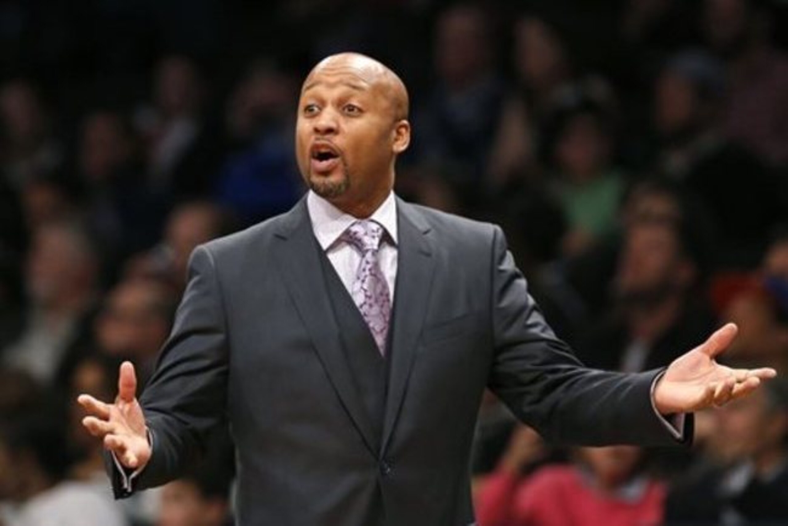 Denver Nuggets coach Brian Shaw gestures during the second half of the Nuggets' NBA basketball game against the Brooklyn Nets on Tuesday, Dec. 23, 2014, in New York. The Nets defeated the Nuggets 102-96. (AP Photo/Kathy Willens)