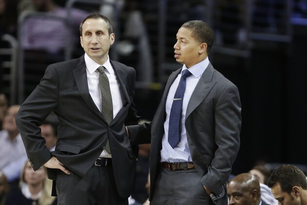 Cleveland Cavaliers head coach David Blatt, left, talks with assistant Tyronn Lue in the fourth quarter of an NBA basketball game against the Minnesota Timberwolves Tuesday, Dec. 23, 2014, in Cleveland. (AP Photo/Mark Duncan)