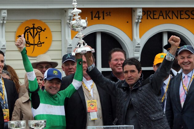 BALTIMORE, MD - MAY 21: Jockey Kent and his brother trainer Keith Desormeaux raises the Woodlawn Vase after Exaggerator wins the Preakness Stakes,  on May 21, 2016 at Pimlico Race Course, Baltimore.  (Photo by Horsephotos/Getty Images)