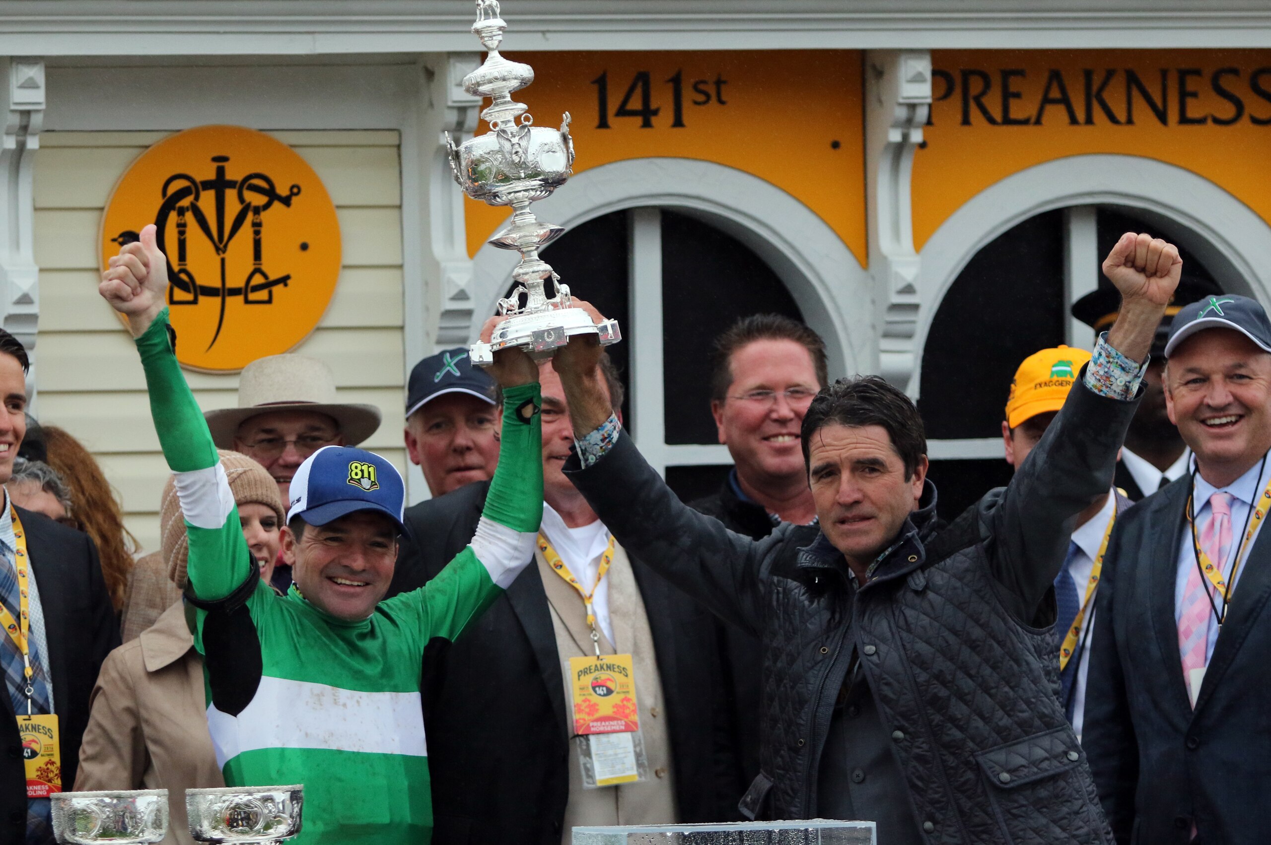 BALTIMORE, MD - MAY 21: Jockey Kent and his brother trainer Keith Desormeaux raises the Woodlawn Vase after Exaggerator wins the Preakness Stakes,  on May 21, 2016 at Pimlico Race Course, Baltimore.  (Photo by Horsephotos/Getty Images)