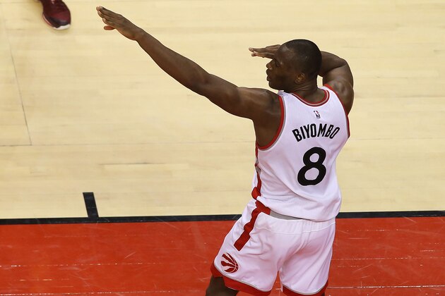 TORONTO, CANADA - MAY 21:  Bismack Biyombo #8 of the Toronto Raptors gestures to the crowd after dunking the ball against the Cleveland Cavaliers in Game Three of the Eastern Conference Finals during the 2016 NBA Playoffs on May 21, 2016 at the Air Canada Centre in Toronto, Ontario, Canada.  NOTE TO USER: User expressly acknowledges and agrees that, by downloading and or using this Photograph, user is consenting to the terms and conditions of the Getty Images License Agreement.  Mandatory Copyright Notice: Copyright 2016 NBAE  (Photo by Dave Sandford/NBAE via Getty Images)