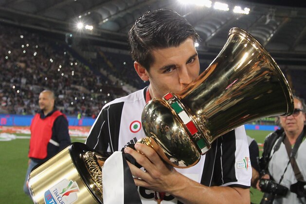 ROME, ITALY - MAY 21: Alvaro Morata of Juventus FC celebrates with the trophy after winning the TIM Cup final match against AC Milan at Stadio Olimpico on May 21, 2016 in Rome, Italy.  (Photo by Paolo Bruno/Getty Images)