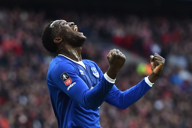 Everton's Belgian striker Romelu Lukaku celebrates after Manchester United's English defender Chris Smalling turned in a cross from Everton's Spanish midfielder Gerard Deulofeu to score an own goal to equalise the scores 1-1 during the English FA Cup semi-final football match between Everton and Manchester United at Wembley Stadium in London on April 23, 2016. / AFP / BEN STANSALL / NOT FOR MARKETING OR ADVERTISING USE / RESTRICTED TO EDITORIAL USE        (Photo credit should read BEN STANSALL/AFP/Getty Images)