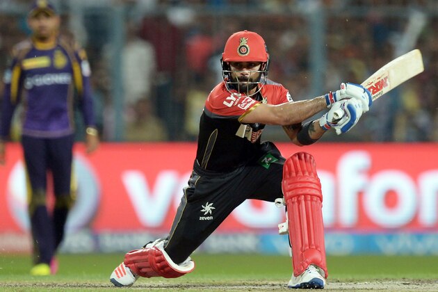 Royal Challengers Bangalore captain Virat Kohli plays a shot during the 2016 Indian Premier League (IPL) Twenty20 cricket match between Kolkata Knight Riders and Royal Challengers Bangalore at the Eden Gardens Cricket Stadium in Kolkata on May 16, 2016.  ----IMAGE RESTRICTED TO EDITORIAL USE - STRICTLY NO COMMERCIAL USE----- / GETTYOUT' / AFP / Dibyangshu SARKAR        (Photo credit should read DIBYANGSHU SARKAR/AFP/Getty Images)