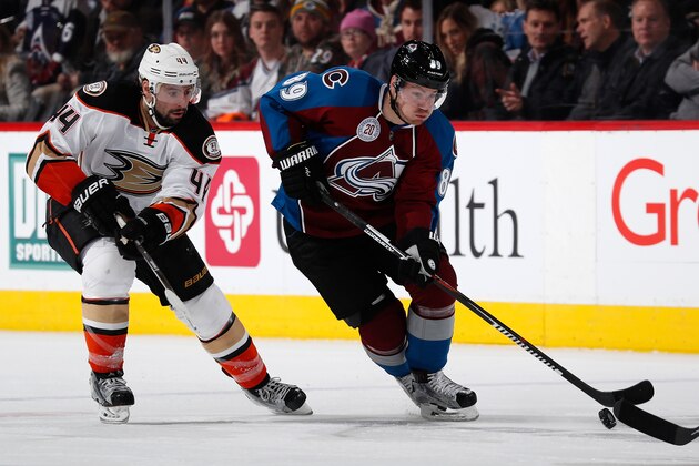 DENVER, CO - MARCH 09:  Mikkel Boedker #89 of the Colorado Avalanche controls the puck against Nate Thompson #44 of the Anaheim Ducks at Pepsi Center on March 9, 2016 in Denver, Colorado. The Avalanche defeated the Ducks 3-0.  (Photo by Doug Pensinger/Getty Images)